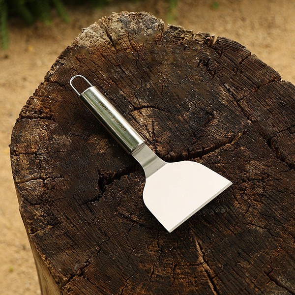 Accessoires - Korte roestvrijstalen spatel.