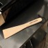 Zubehör - Plancha-Schaber aus Holz.